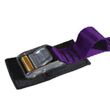 Close up product photo of purple tie down cam strap featuring a rollercam buckle, sewn gear loop, and buckle pad made from black seatbelt webbing.
