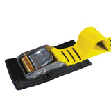 Close up product photo of yellow tie down cam strap featuring a rollercam buckle, sewn gear loop, and buckle pad made from black seatbelt webbing.