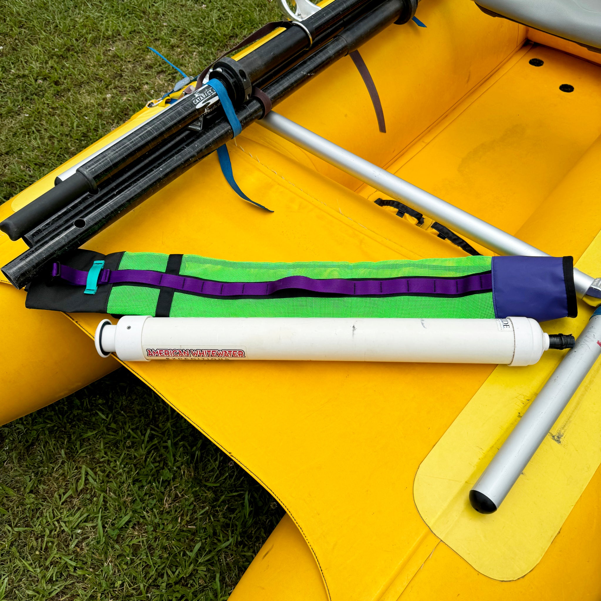 k pump bag in lime green mesh with purple vinyl for k-200 hand pump on yellow raft