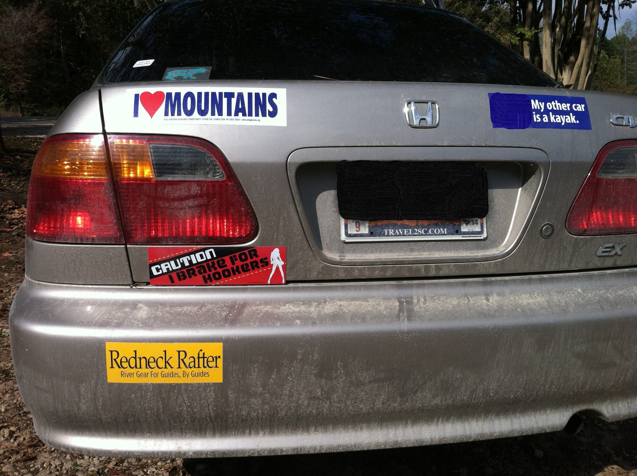 Redneck Rafter™ bumper sticker on car.